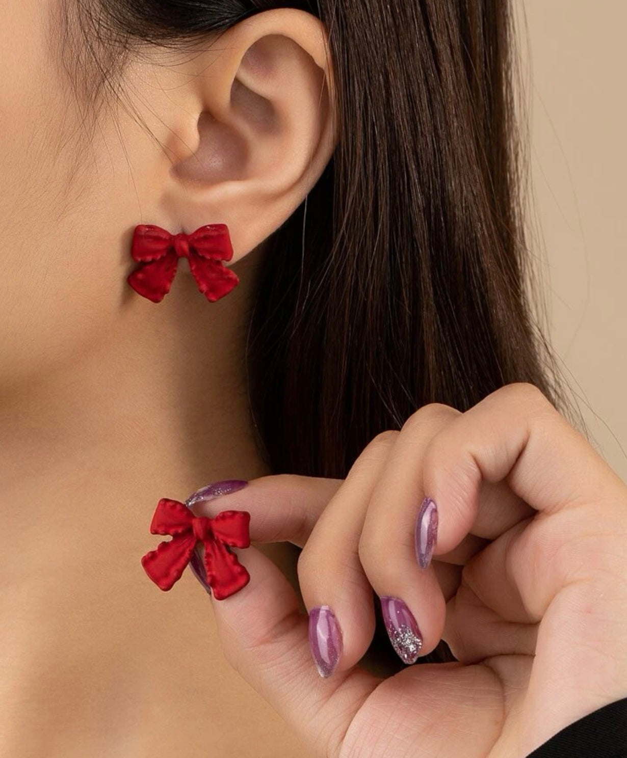 Belles boucles d'oreilles en forme de nœud rose