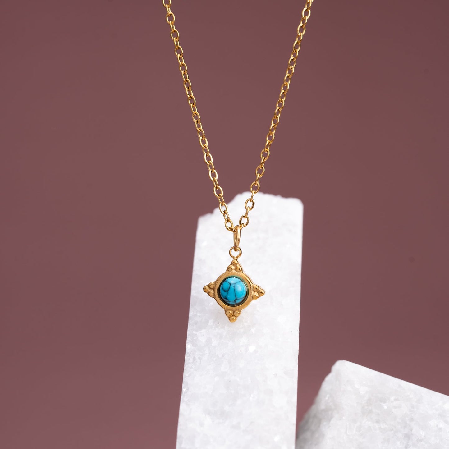 Collier avec rose des vents turquoise