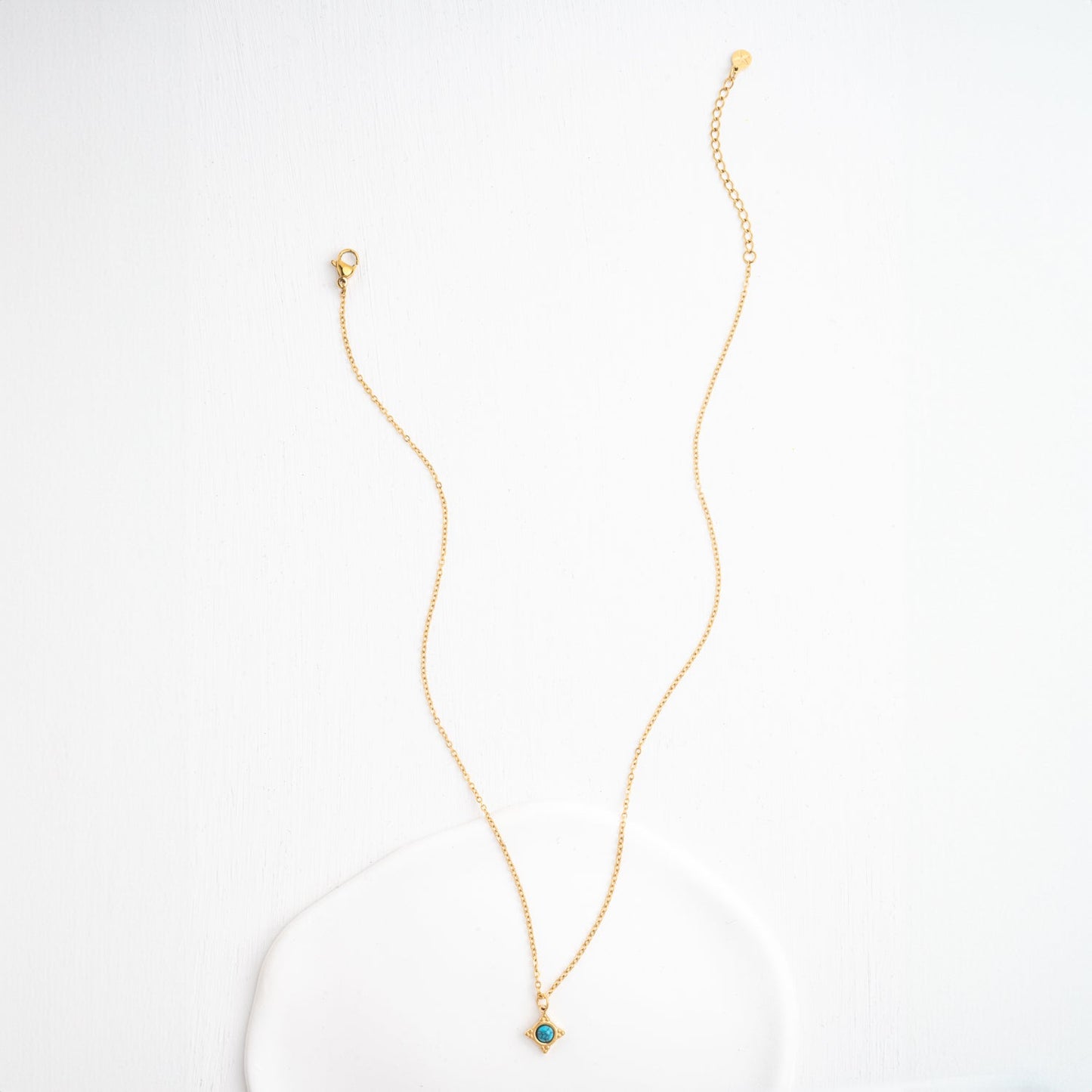 Collier avec rose des vents turquoise