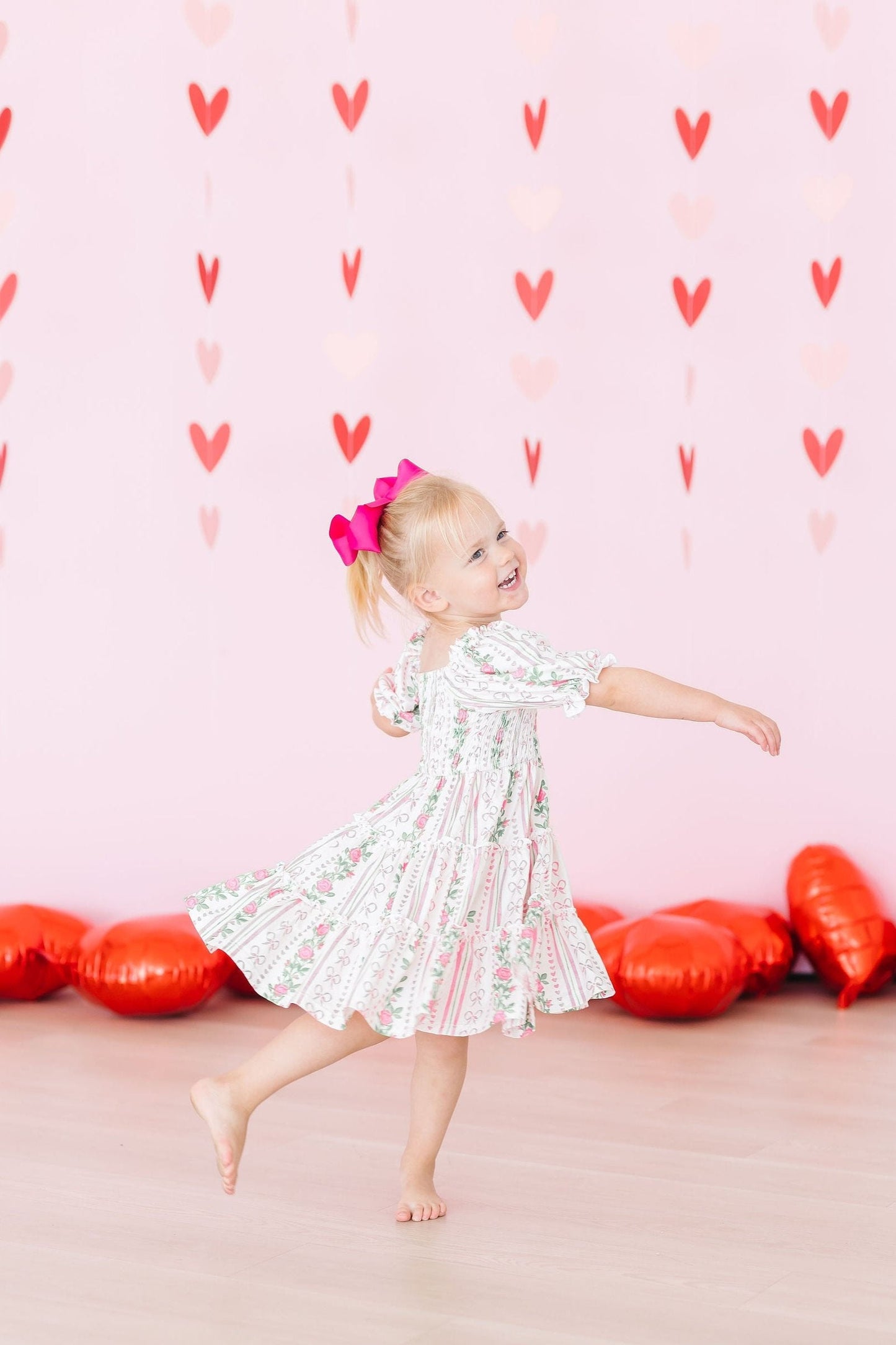 Rosebud Bows Smocked Ruffle Dress