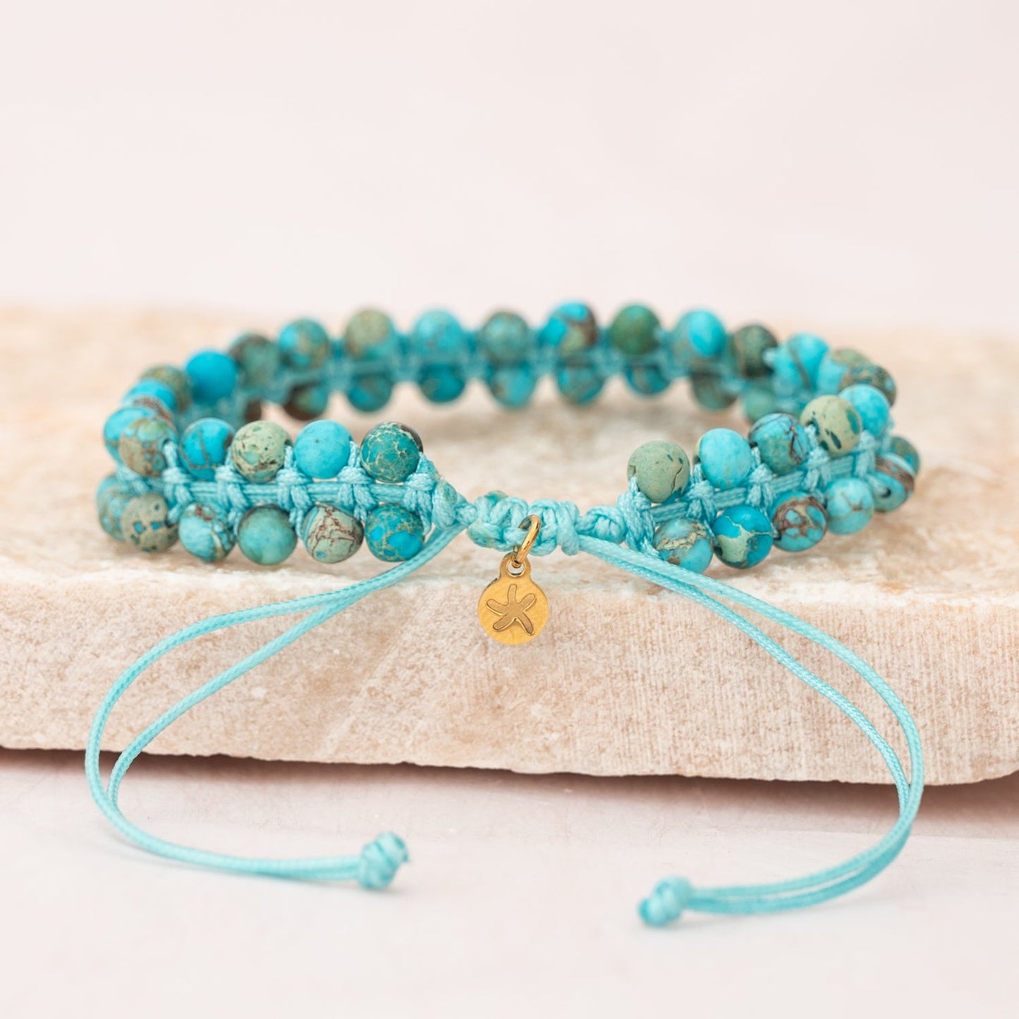 Bracelet en perles tissées à la main bleu turquoise