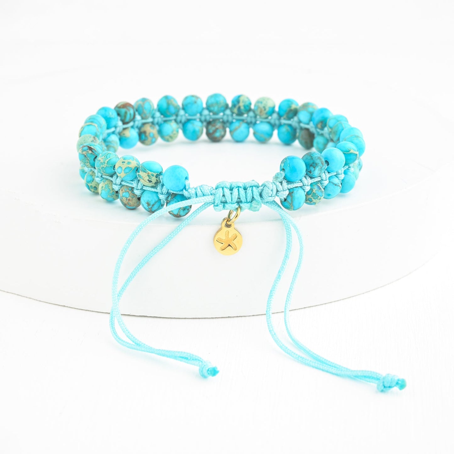 Bracelet en perles tissées à la main bleu turquoise