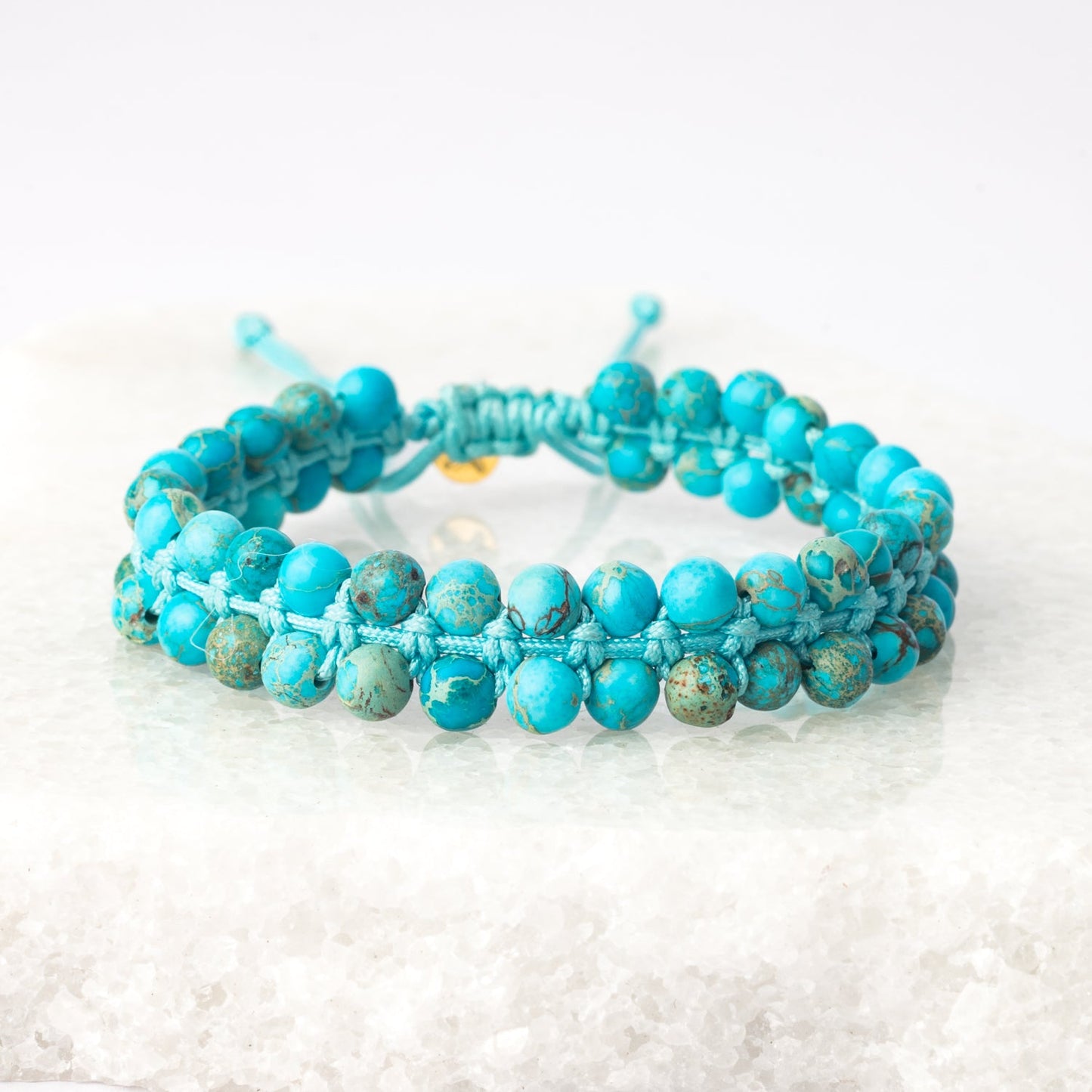 Bracelet en perles tissées à la main bleu turquoise