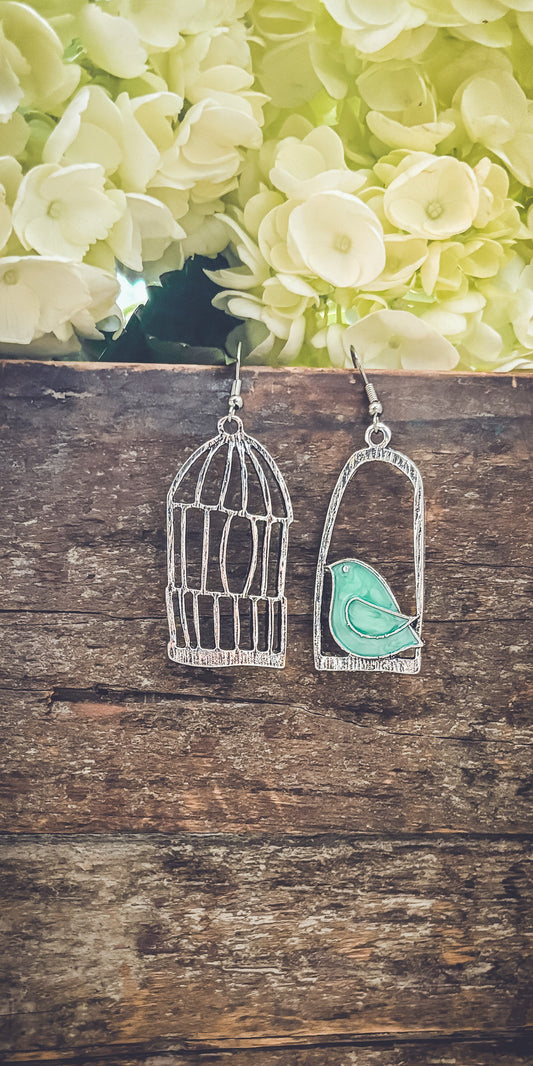 Boucles d'oreilles magnifiques en forme d'oiseau libre