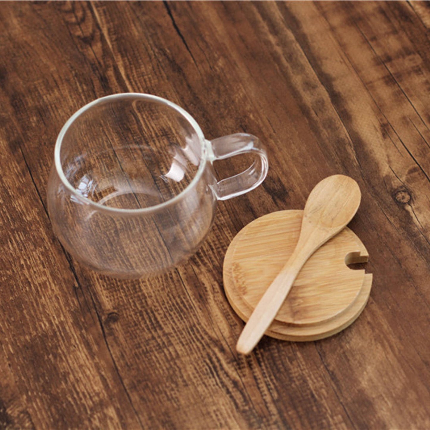 Taza de té de vidrio de borosilicato con tapa de bambú y cuchara