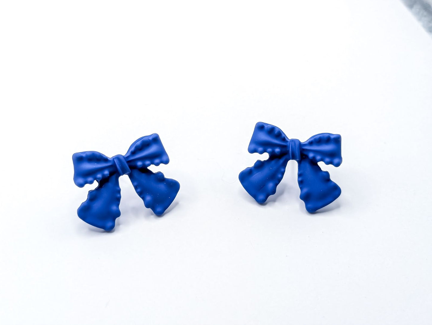 Boucles d'oreilles à jolis nœuds bleus