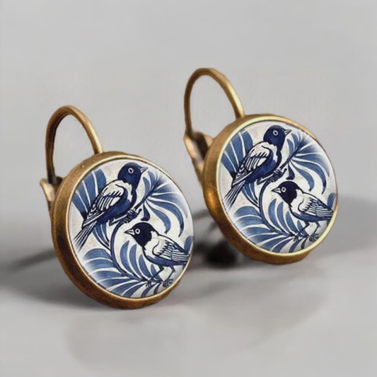 Belles boucles d'oreilles oiseaux vintage