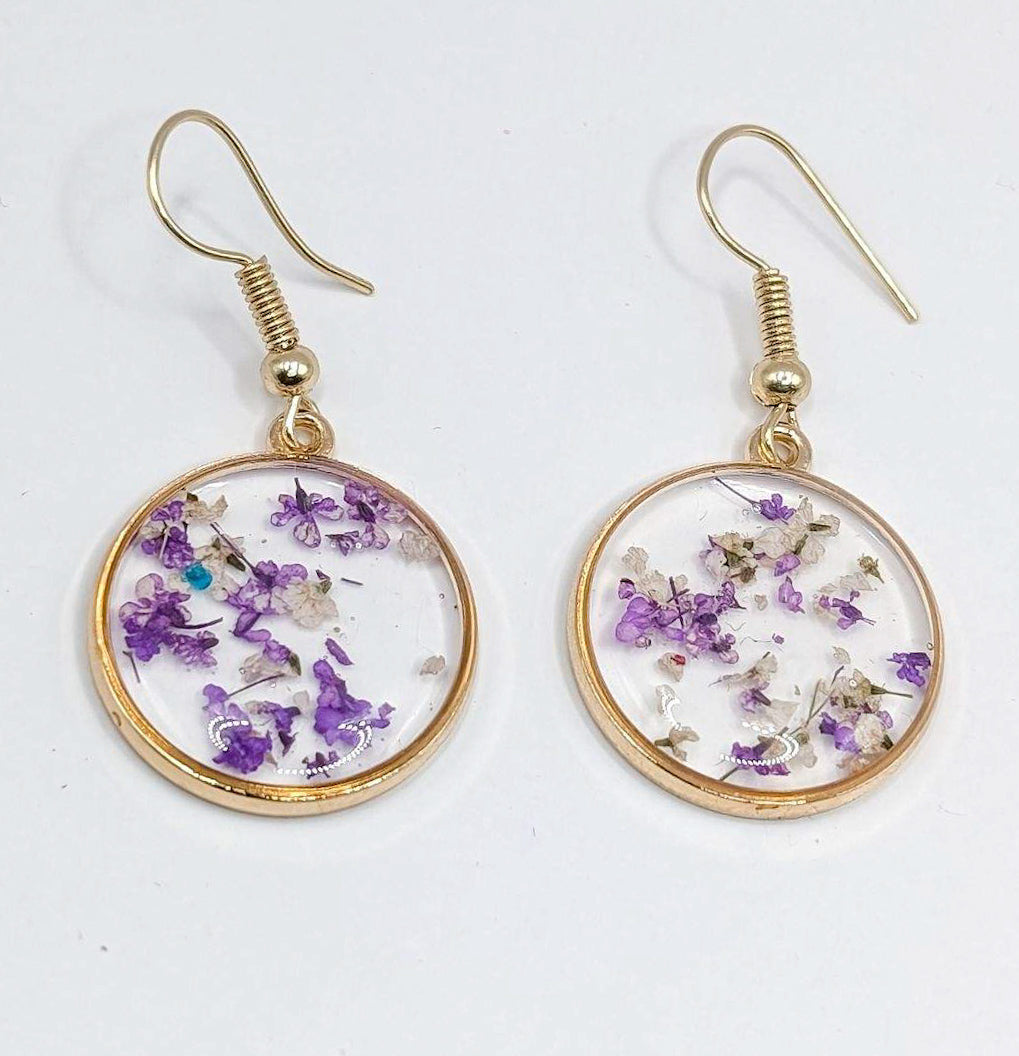 Hermosos aretes de flores moradas