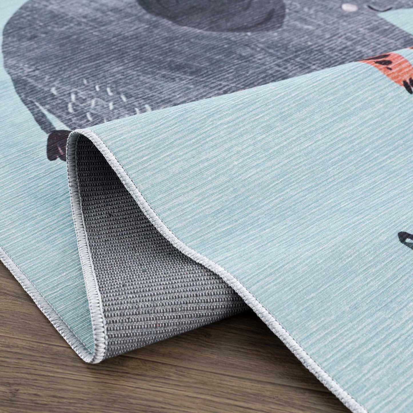 Alfombra lavable para niños con estampado animal Petey Blue