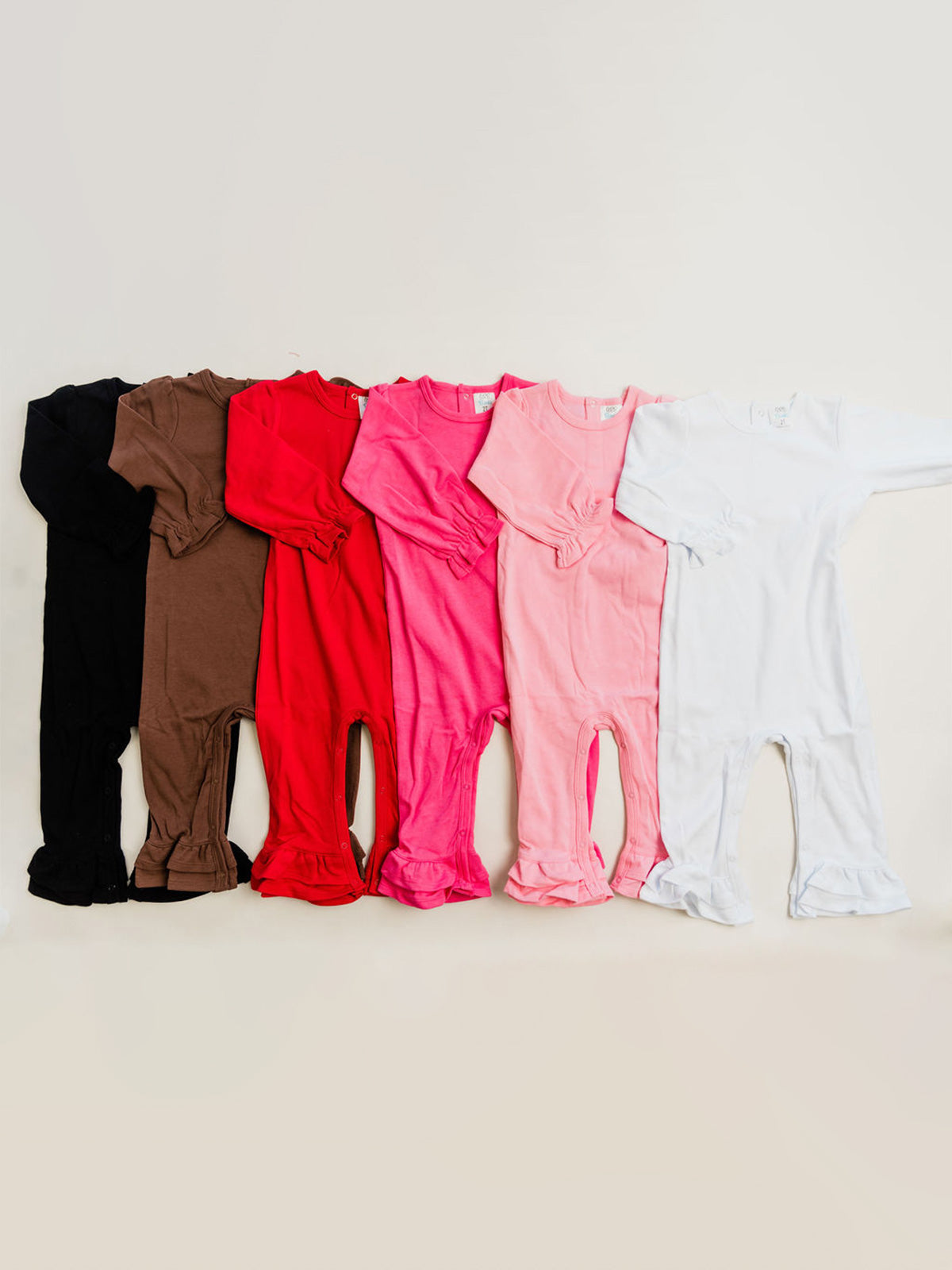 Girl’s Long Sleeve Ruffle Rompers - ARB Blanks