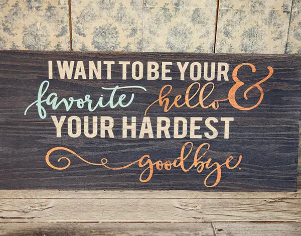 Dark wood Cerusing Wax sign in white teal orange script