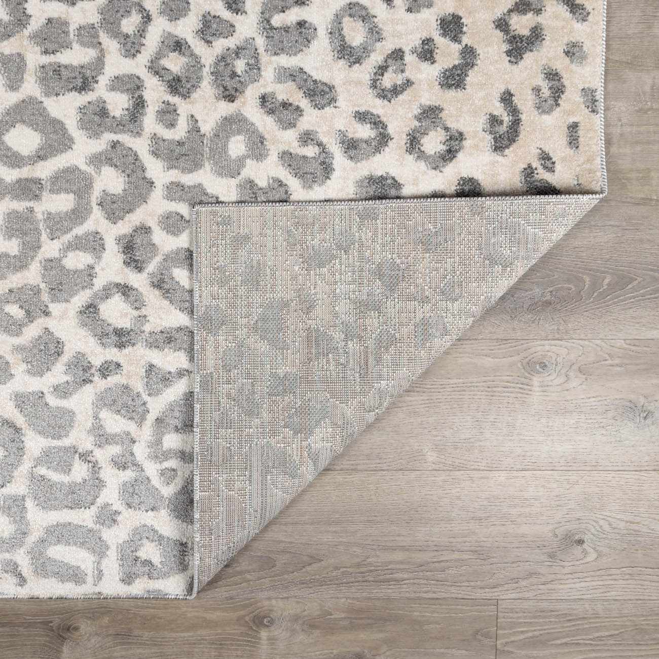 Beige Liversedge Leopard Print Area Rug - Boutique Rugs