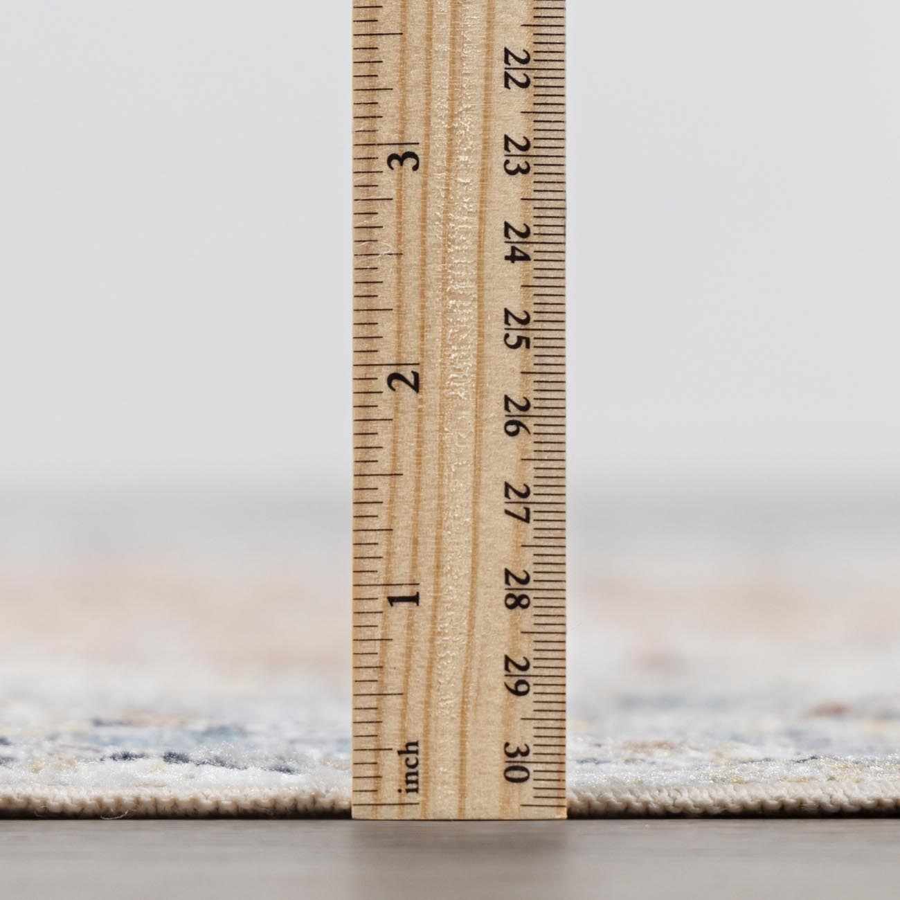 Emke Cream Washable Area Rug - Boutique Rugs