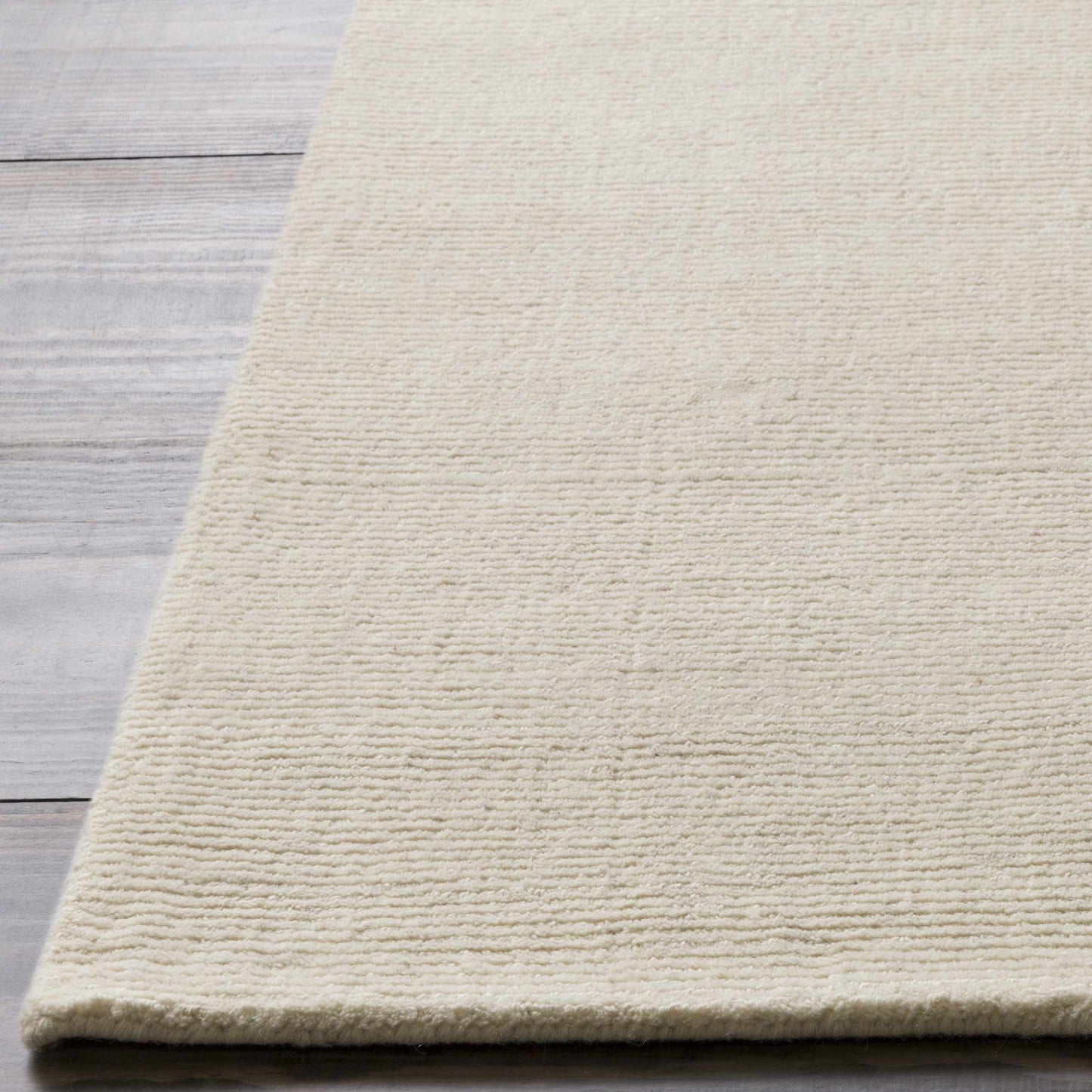 Brockton Solid Wool Light Beige Area Rug