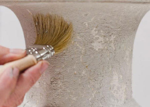 Hand brushing cracked patina finish with natural bristle tool