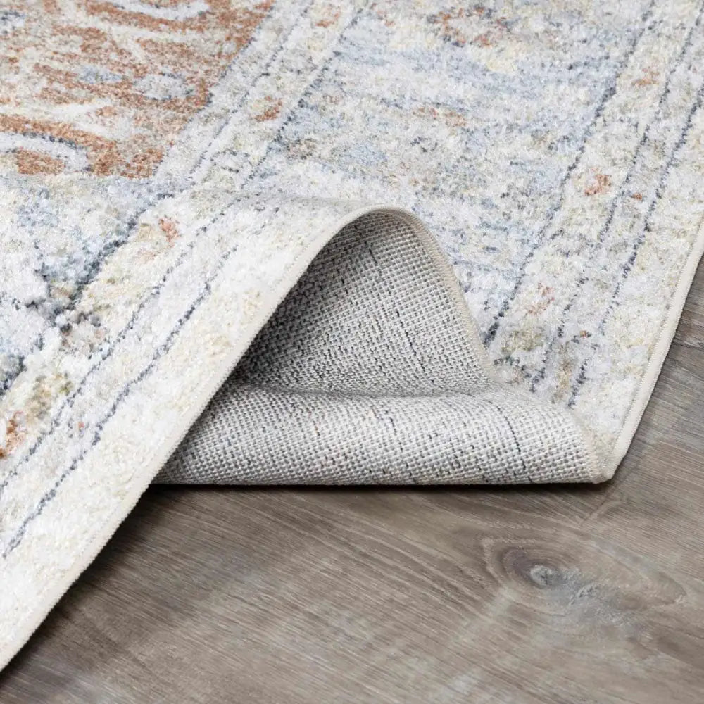 Emke Cream Washable Area Rug - Boutique Rugs