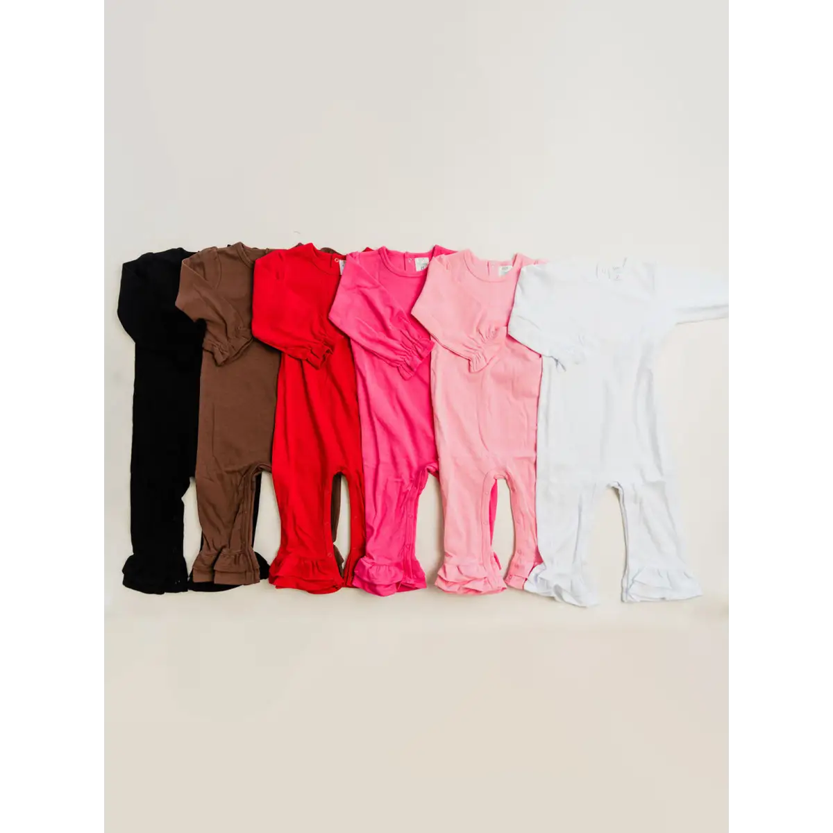 Girl’s Long Sleeve Ruffle Rompers - ARB Blanks