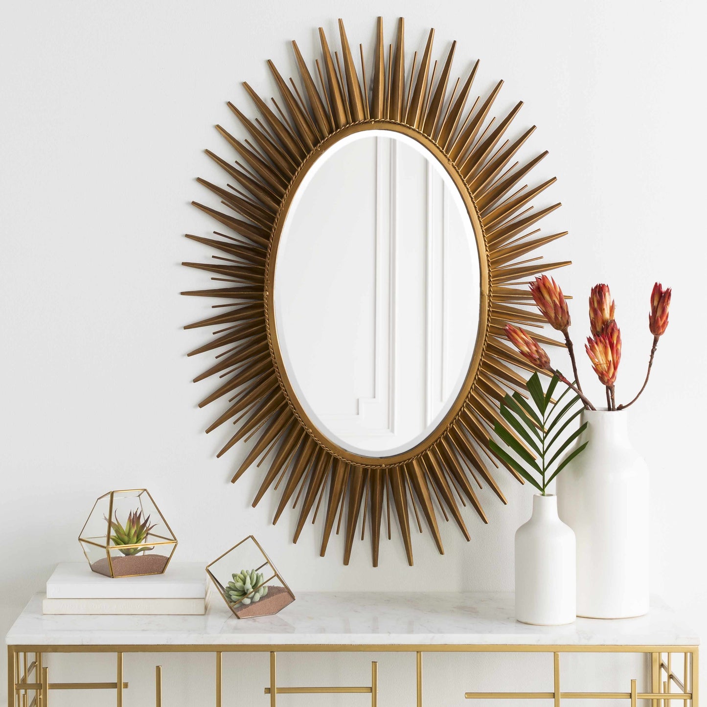 Oval Starburst Metal Mirror
