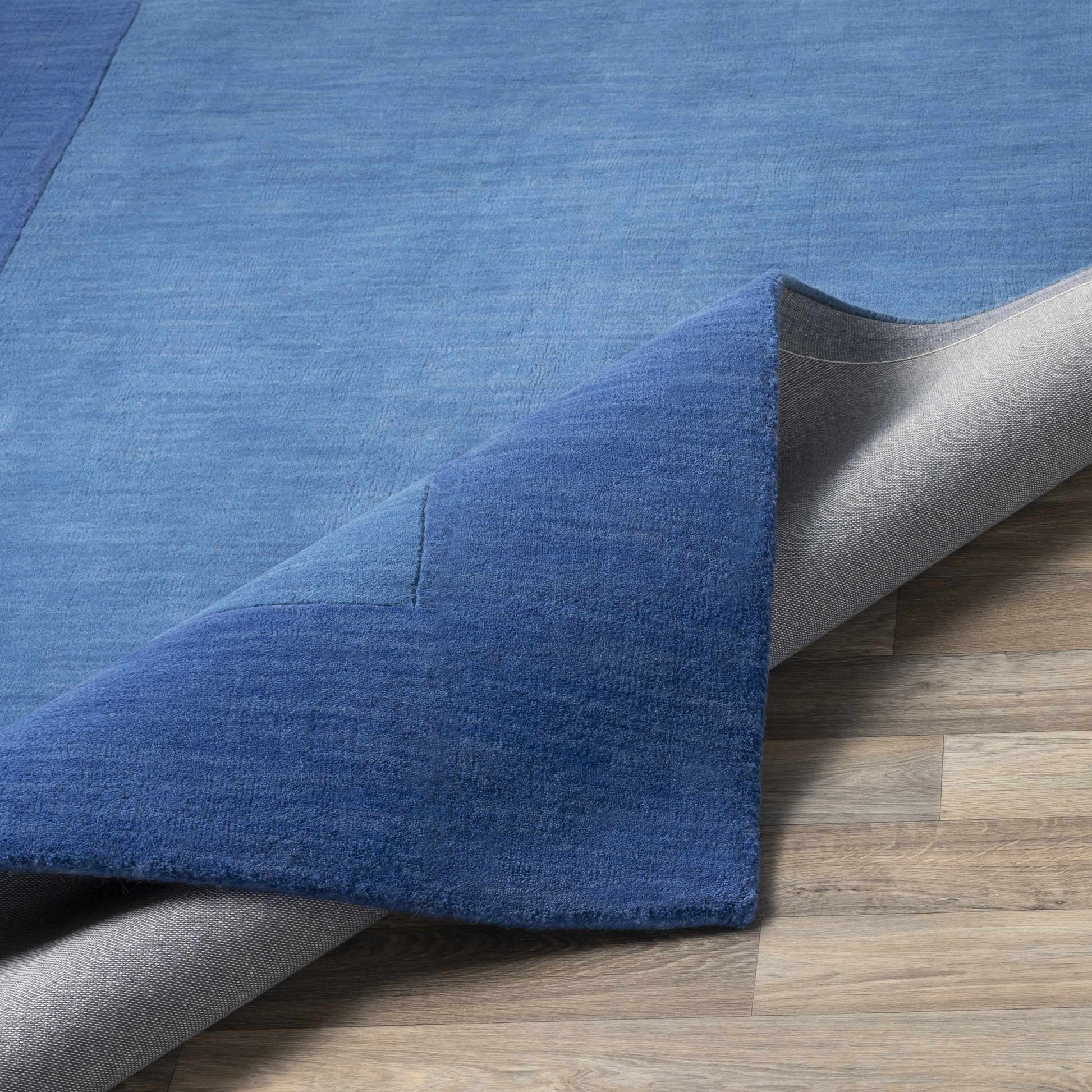 Solid Blue Bordered Wool Rug - Boutique Rugs