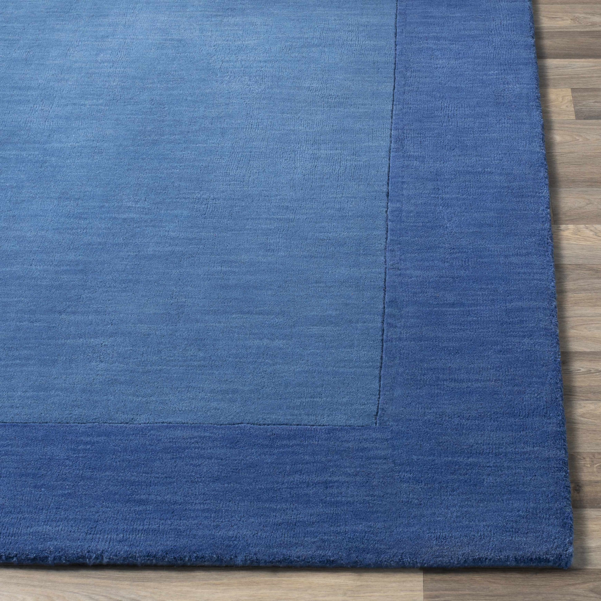 Solid Blue Bordered Wool Rug - Boutique Rugs