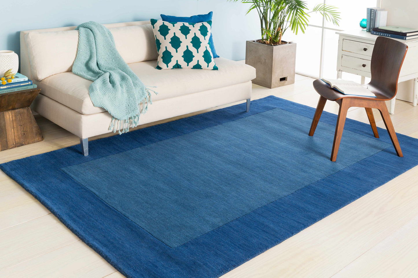 Solid Blue Bordered Wool Rug - Boutique Rugs