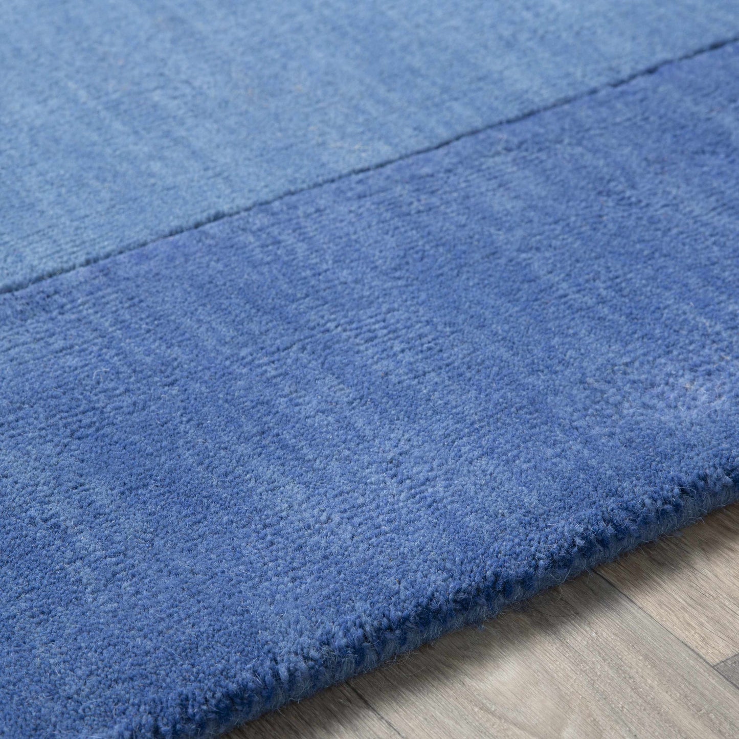 Solid Blue Bordered Wool Rug - Boutique Rugs