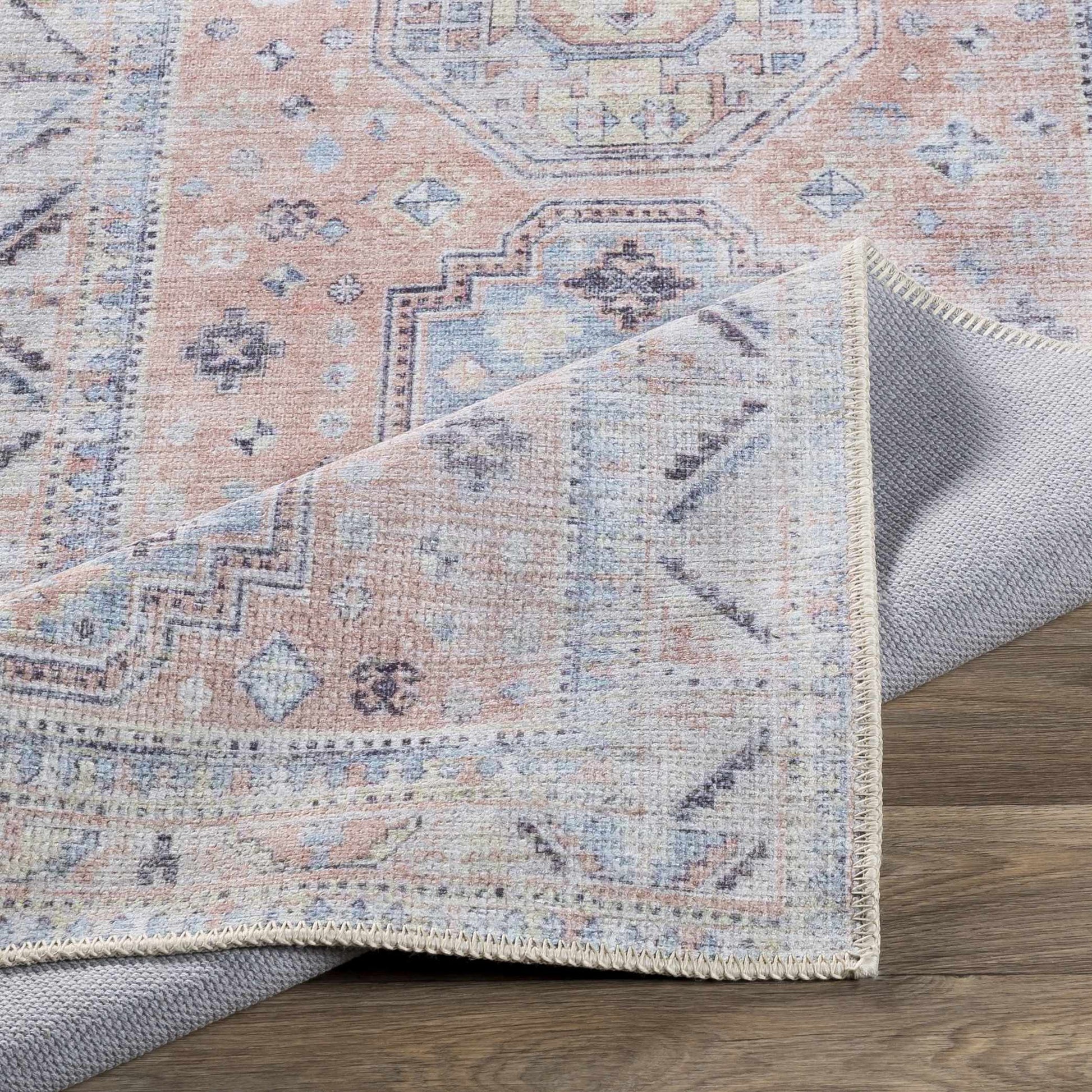 Morcott Peach Washable Area Rug - Boutique Rugs