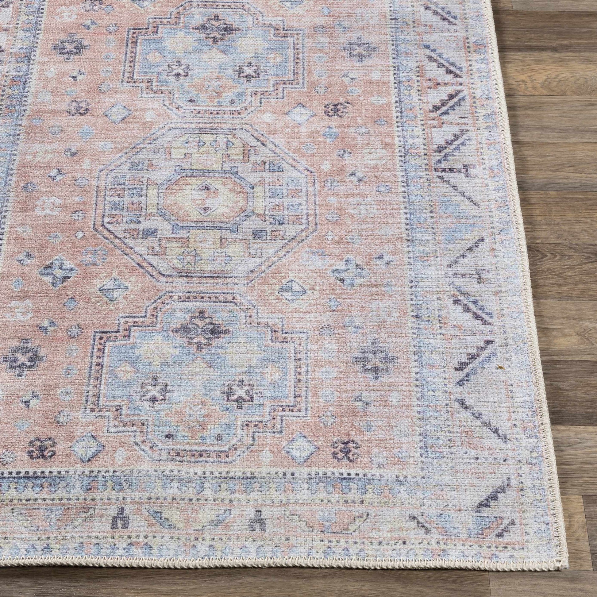 Morcott Peach Washable Area Rug - Boutique Rugs