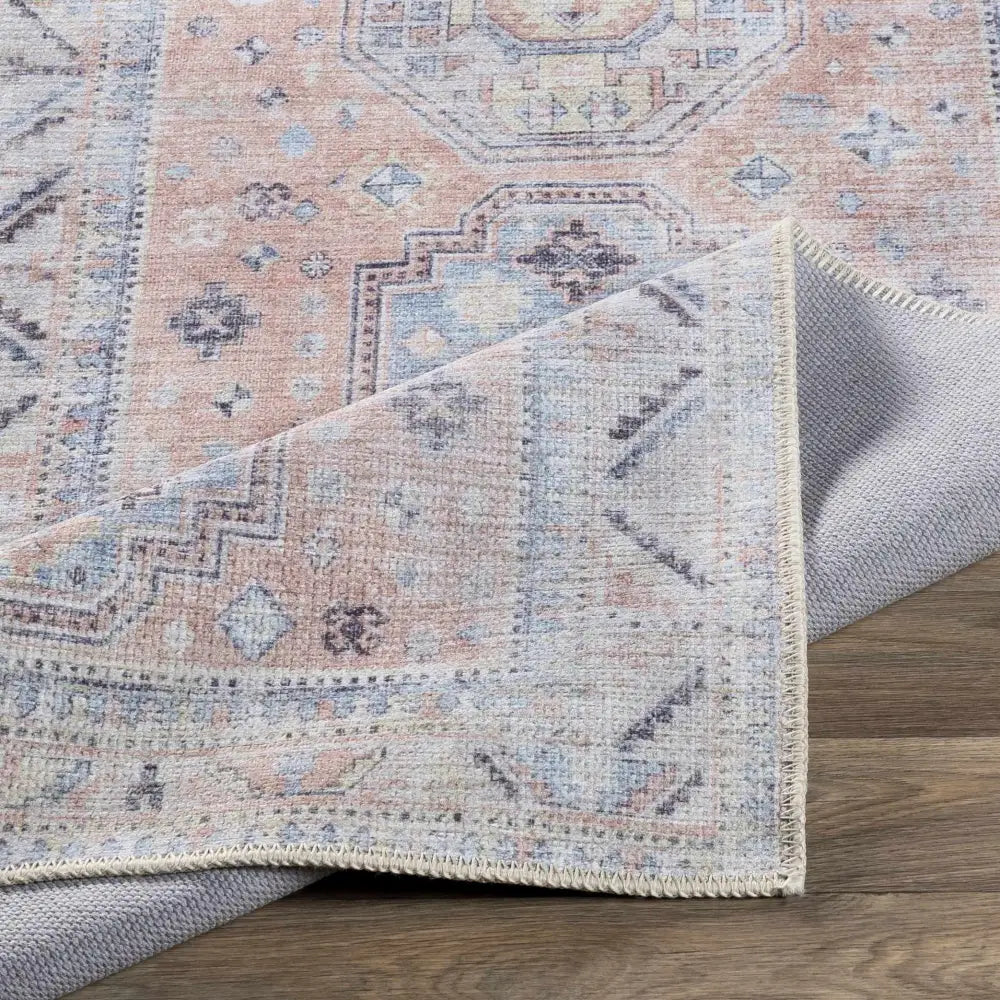 Morcott Peach Washable Area Rug - Boutique Rugs