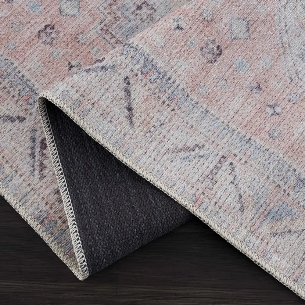 Morcott Peach Washable Area Rug - Boutique Rugs