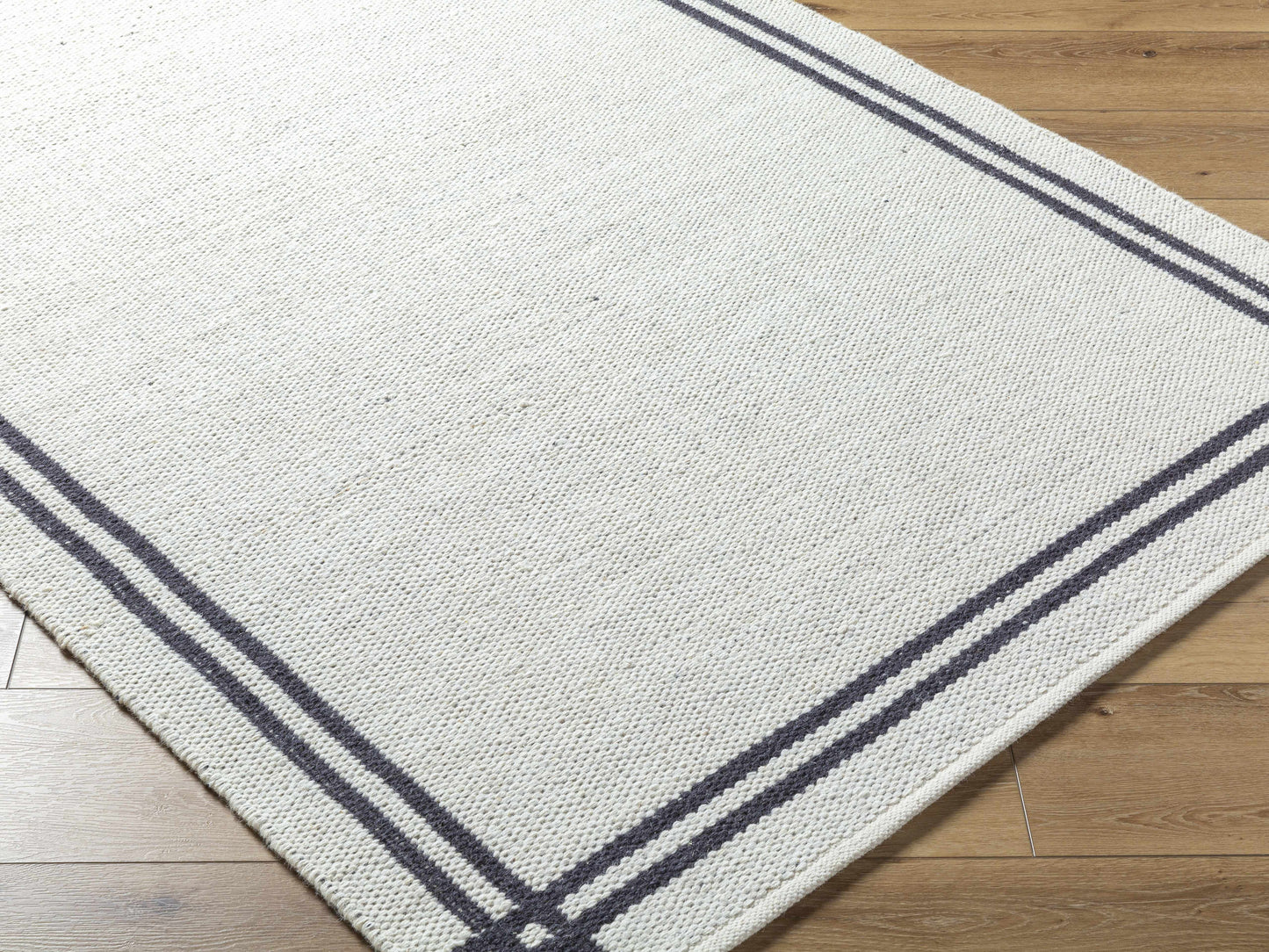 Black Stripe Bordered Wool Rug - Boutique Rugs