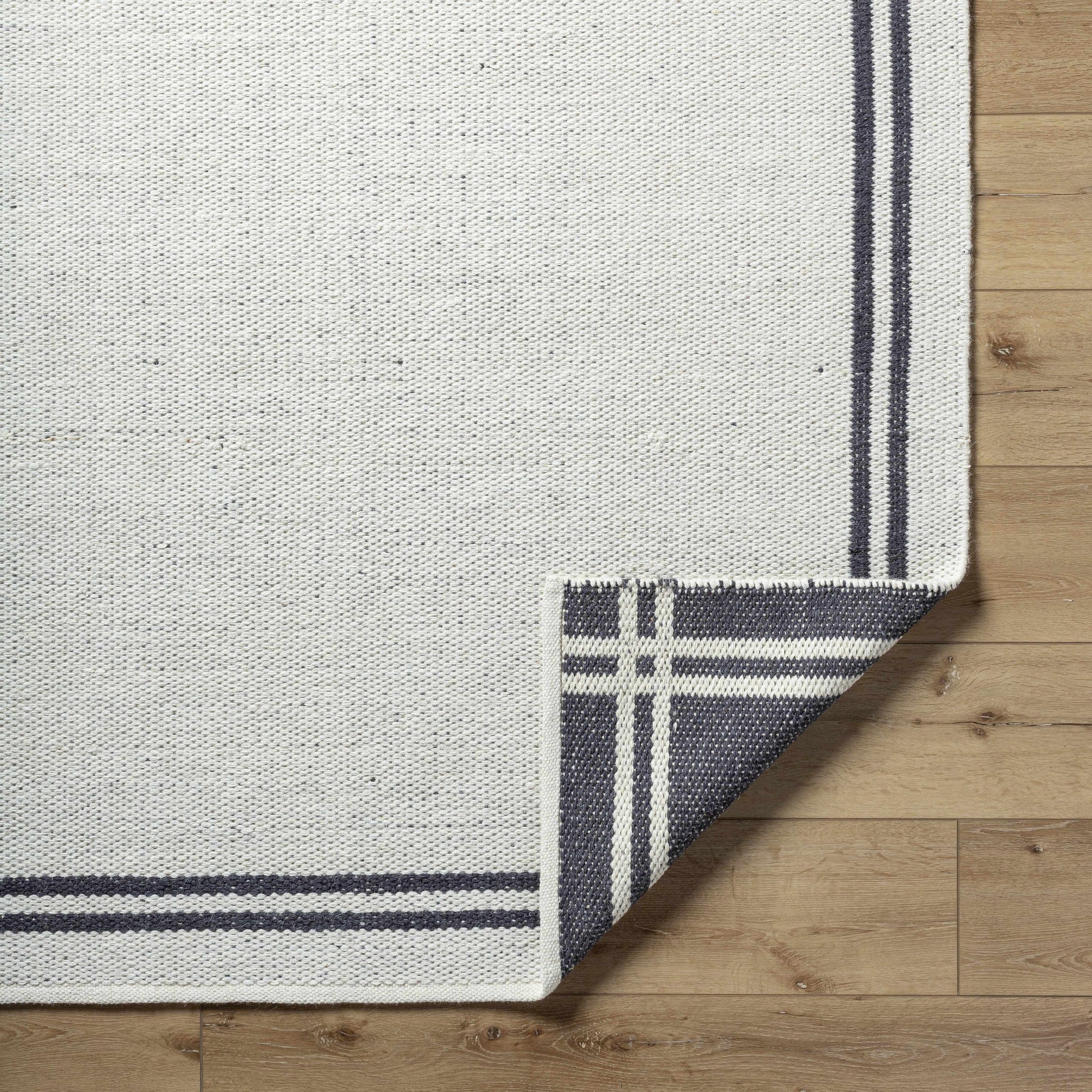 Black Stripe Bordered Wool Rug - Boutique Rugs