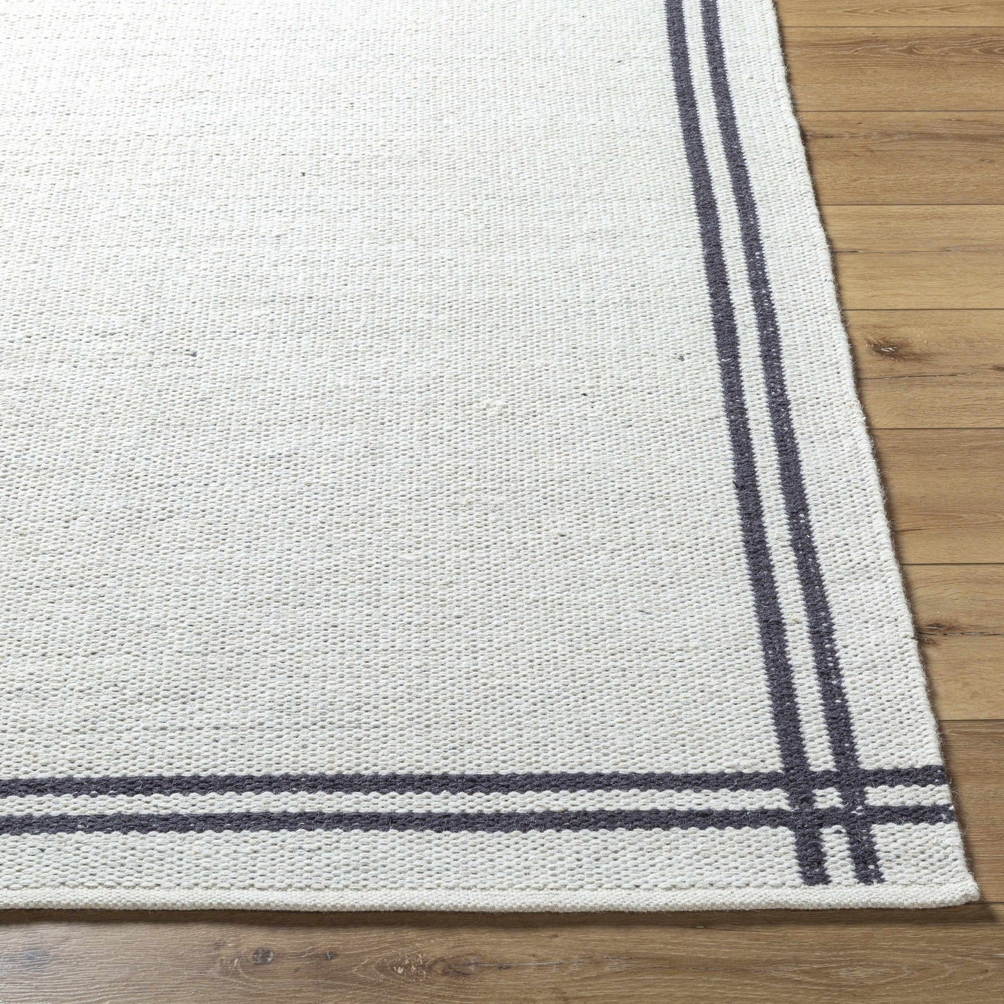 Black Stripe Bordered Wool Rug - Boutique Rugs