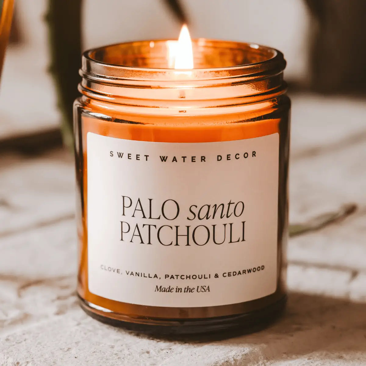 Palo Santo Patchouli Soy Candle - Amber Jar - 9 oz - Sweet Water Decor