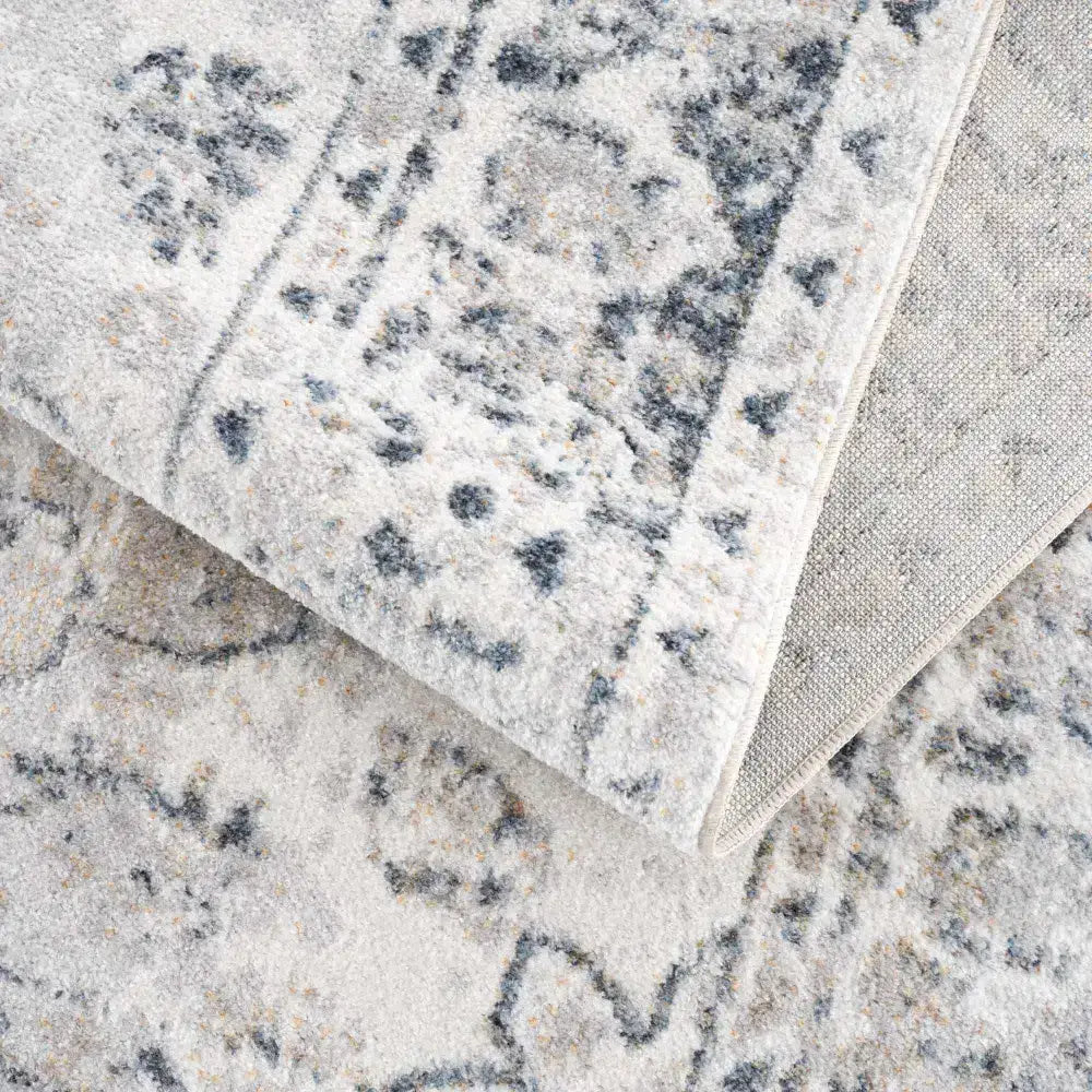 Rudo Cream Washable Area Rug - Boutique Rugs