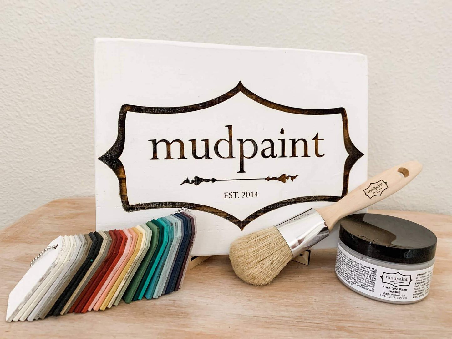 MudPaint logo with paint chips
